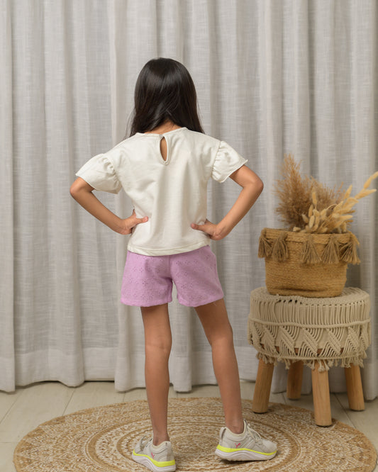 White Top And Purple Shorts