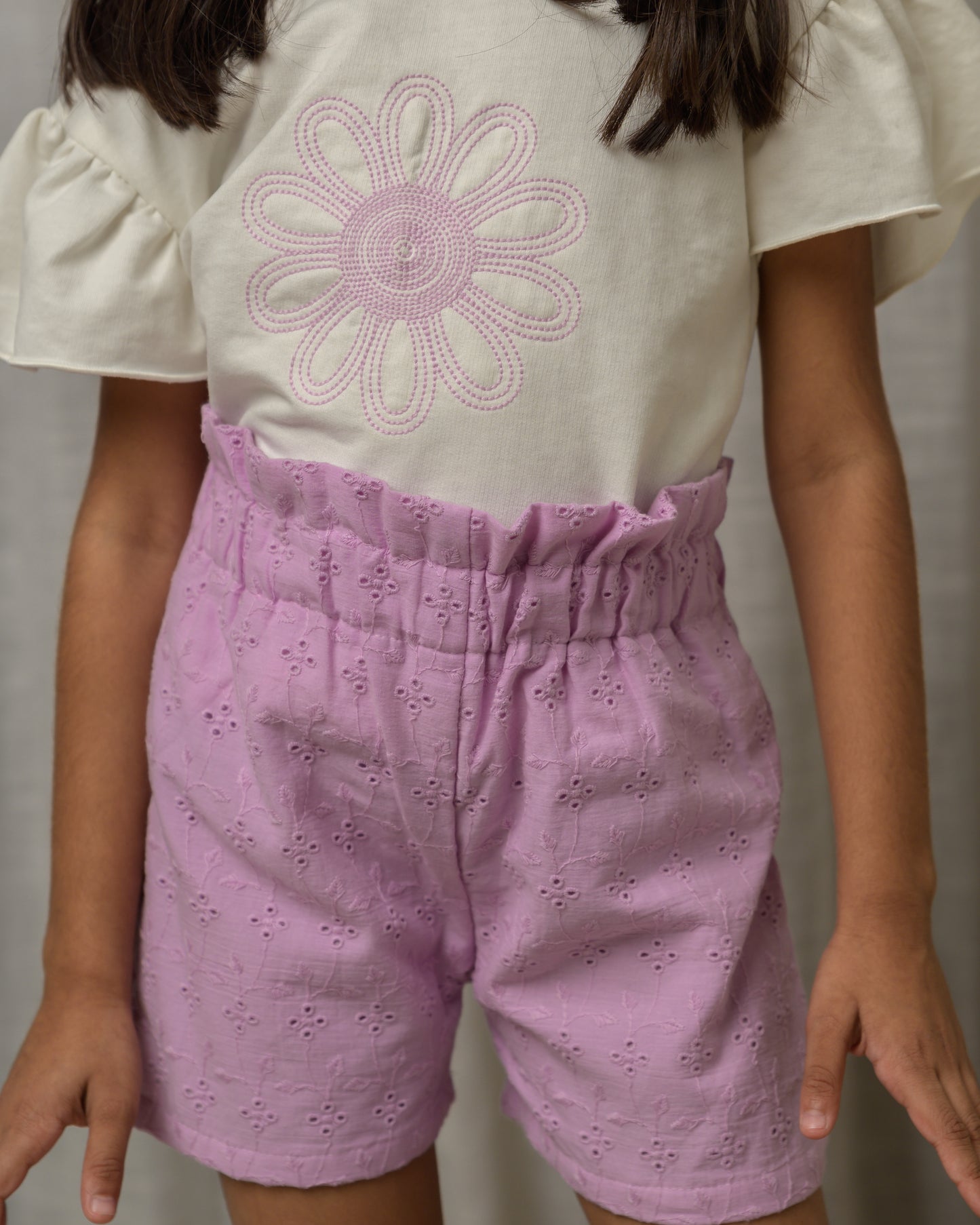White Top And Purple Shorts