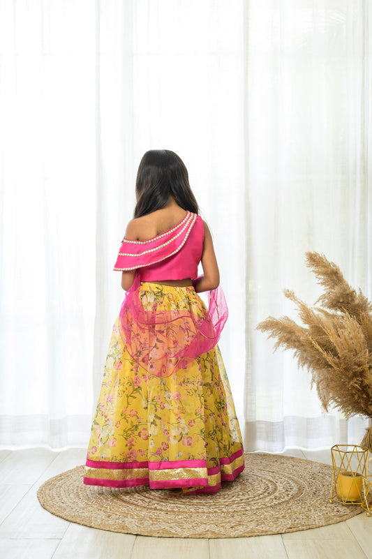 Yellow Organza lehenga with Pink Offshoulder