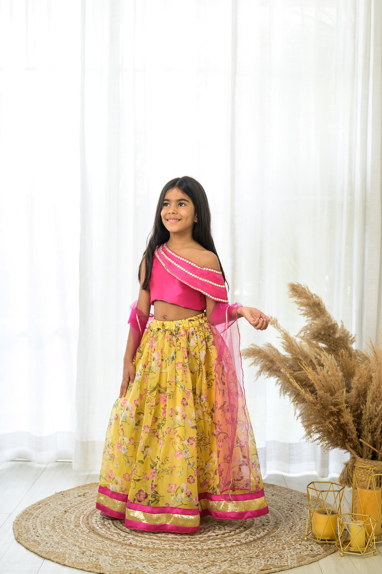 Yellow Organza lehenga with Pink Offshoulder