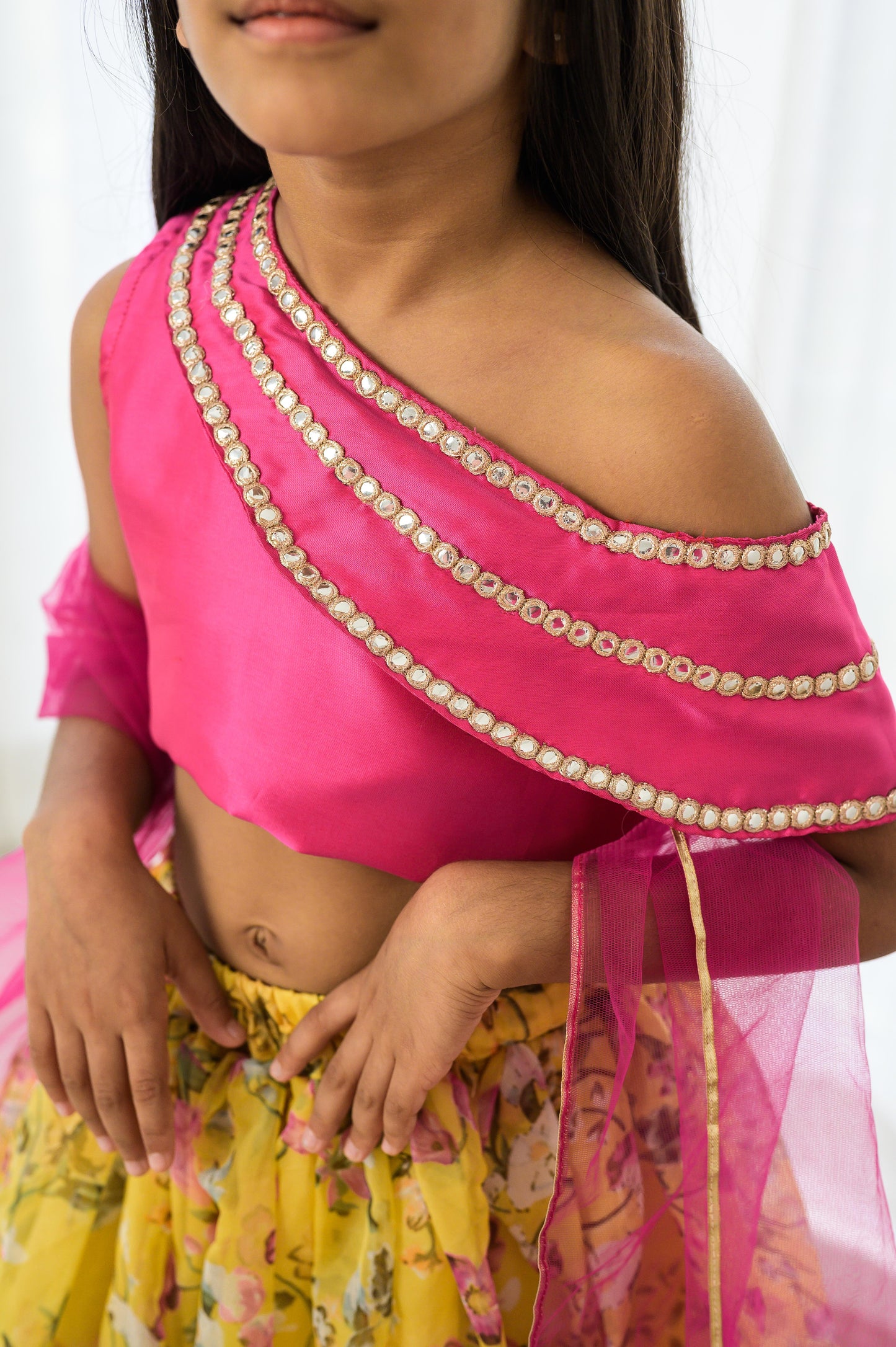 Yellow Organza lehenga with Pink Offshoulder