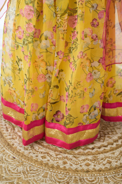 Yellow Organza lehenga with Pink Offshoulder